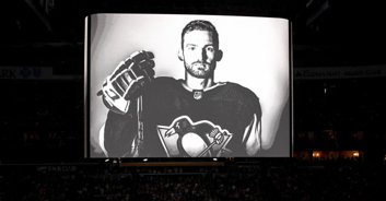 Girlfriend of ice hockey star who died after being slashed during game ran onto ice after accident