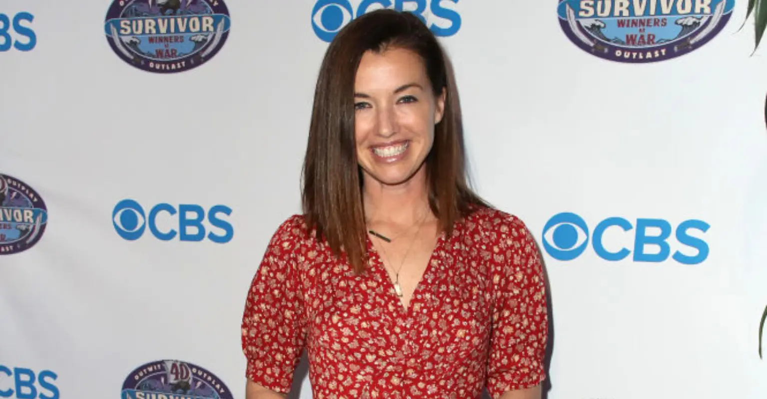 'Survivor' star comes out as gay by sharing sweet snap kissing comedian Mae Martin