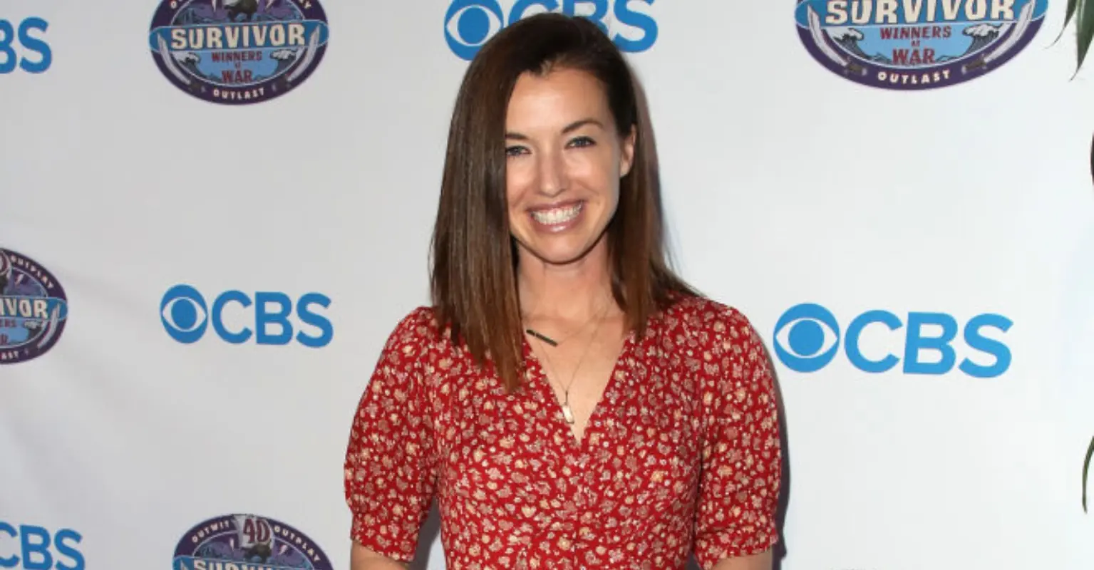 'Survivor' star comes out as gay by sharing sweet snap kissing comedian Mae Martin