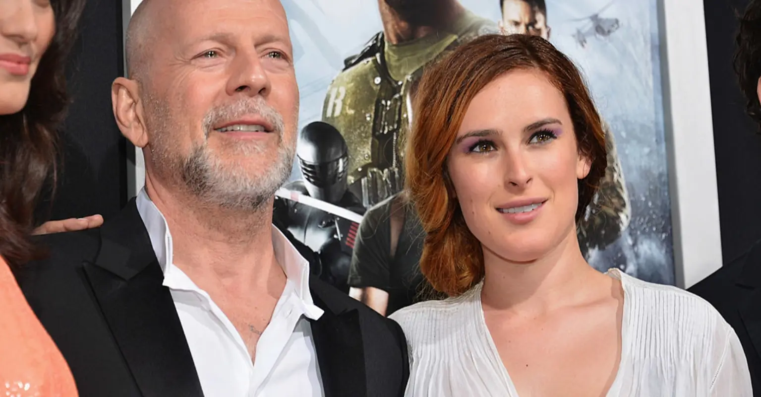Rumer Willis shares rare throwback photo with dad Bruce as daughters have their say on whether 'Die Hard' is a Christmas movie