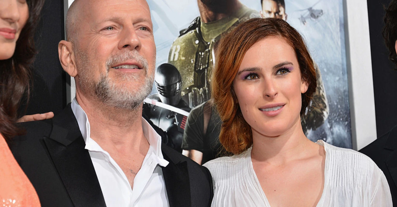 Rumer Willis shares rare throwback photo with dad Bruce as daughters have their say on whether 'Die Hard' is a Christmas movie