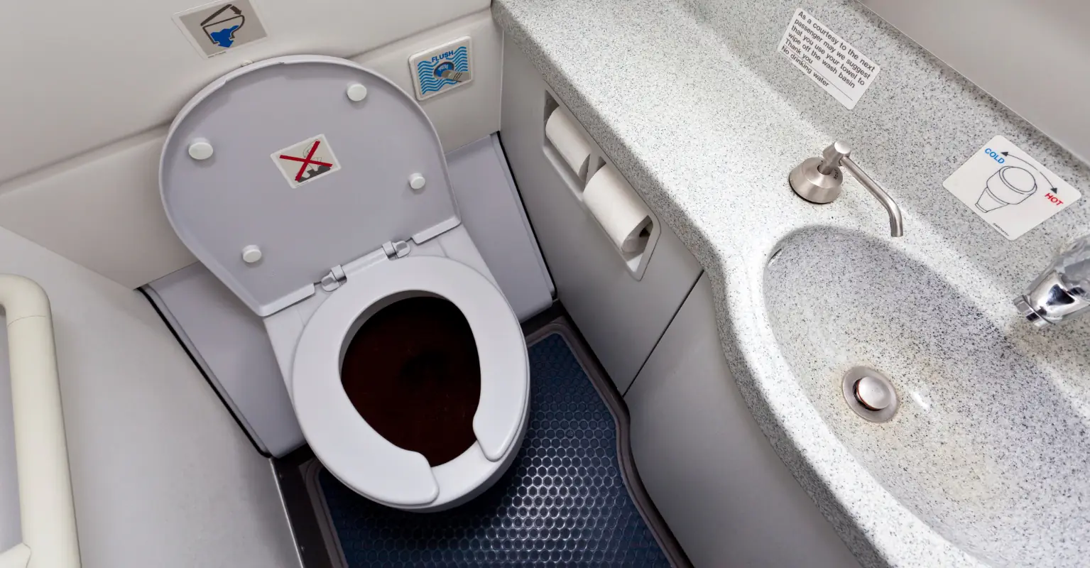 Man who got trapped in airplane toilet for entire flight is told in note under door from staff: 'Sir, we tried our best'