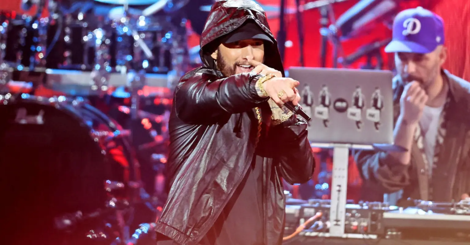 Eminem is slammed for flipping off 49ers fans as he cheers on the Detroit Lions