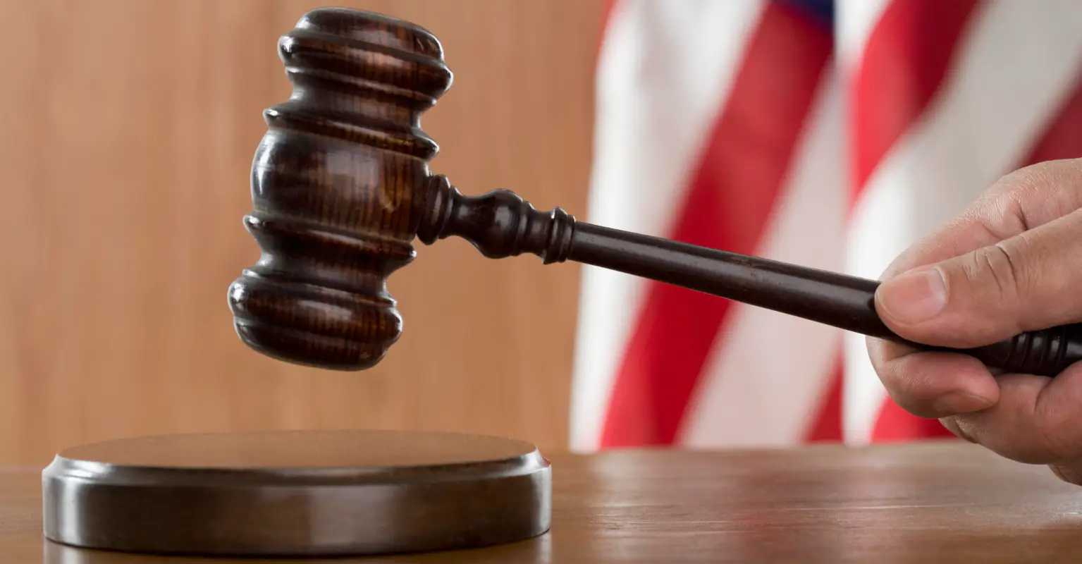 Terrifying moment felon leaps over judge's bench and attacks her for denying his probation caught on camera