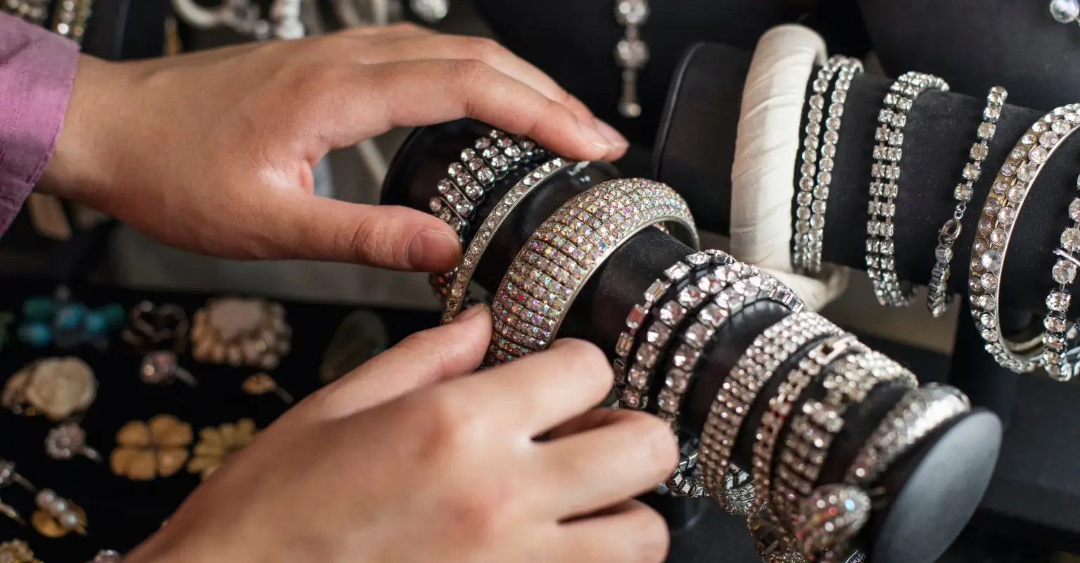 Woman who bought $2 'tide pod' necklace at thrift store is stunned to find out how much it's really worth