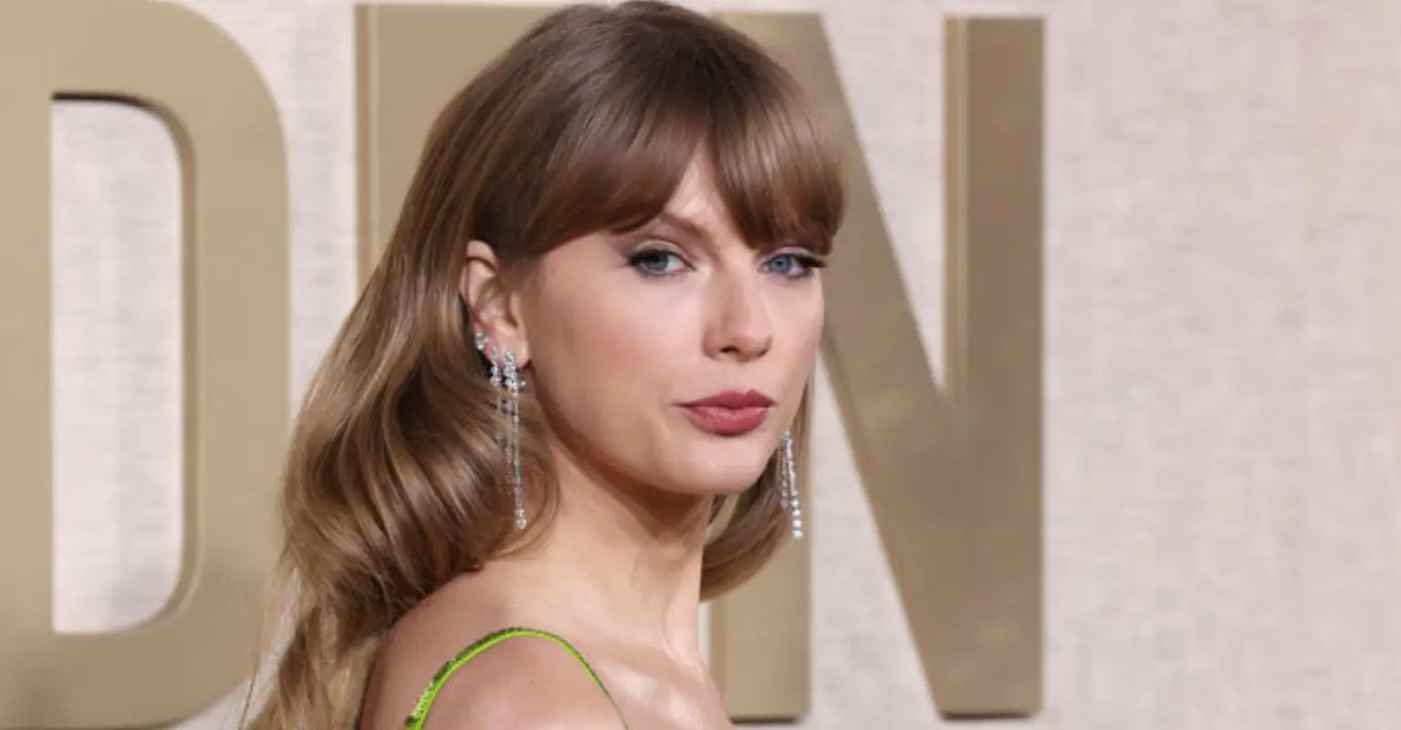 Taylor Swift looks very unimpressed after Golden Globes host Jo Koy makes NFL dig