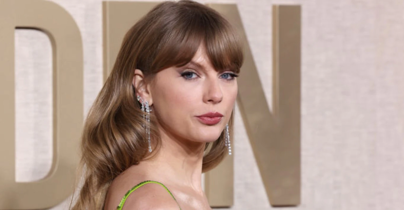 Taylor Swift looks very unimpressed after Golden Globes host Jo Koy makes NFL dig