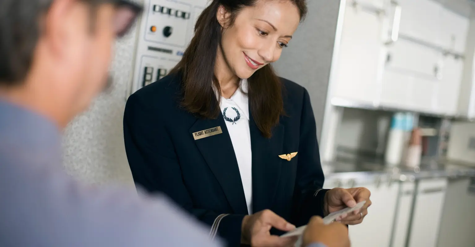 Flight attendant reveals what they're 'really doing' when they ask to see your boarding pass