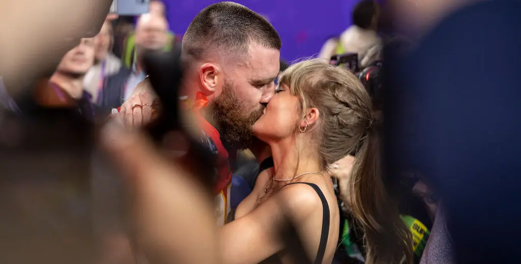 Taylor Swift rushes onto pitch to kiss Travis Kelce after Super Bowl win