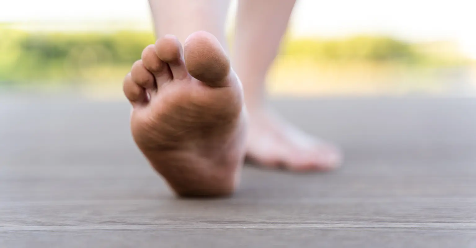 People are confused after couple cut out soles of their shoes to walk barefoot