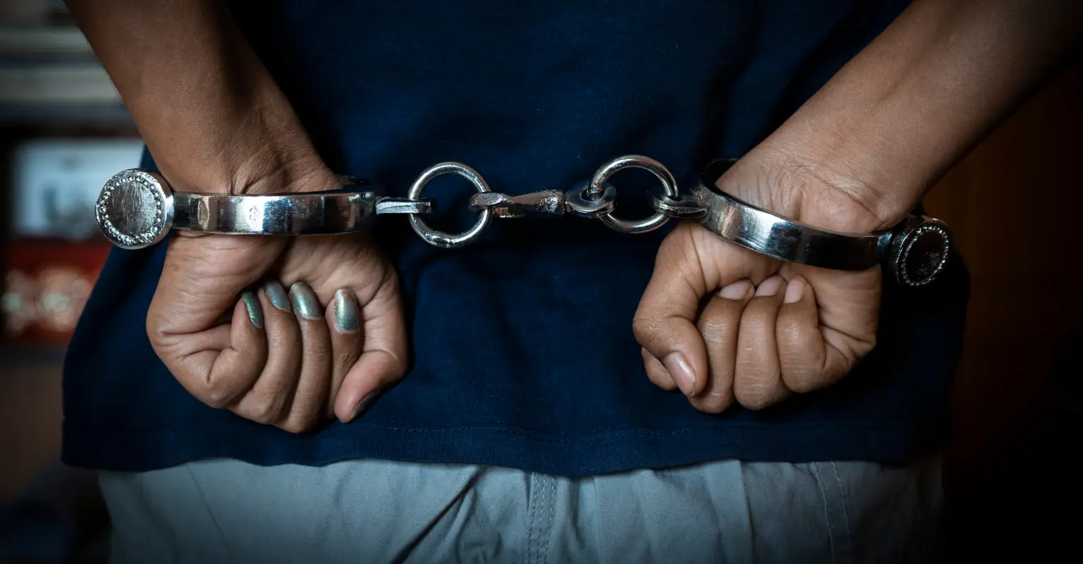 Woman dies handcuffed in back of police car after officer drives into river