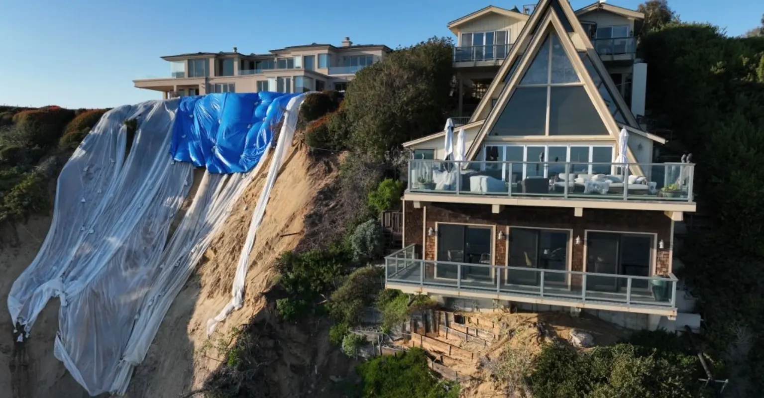 California homeowner 'checks his house every hour' after multi-million dollar mansion is left teetering on edge of cliff by landslides