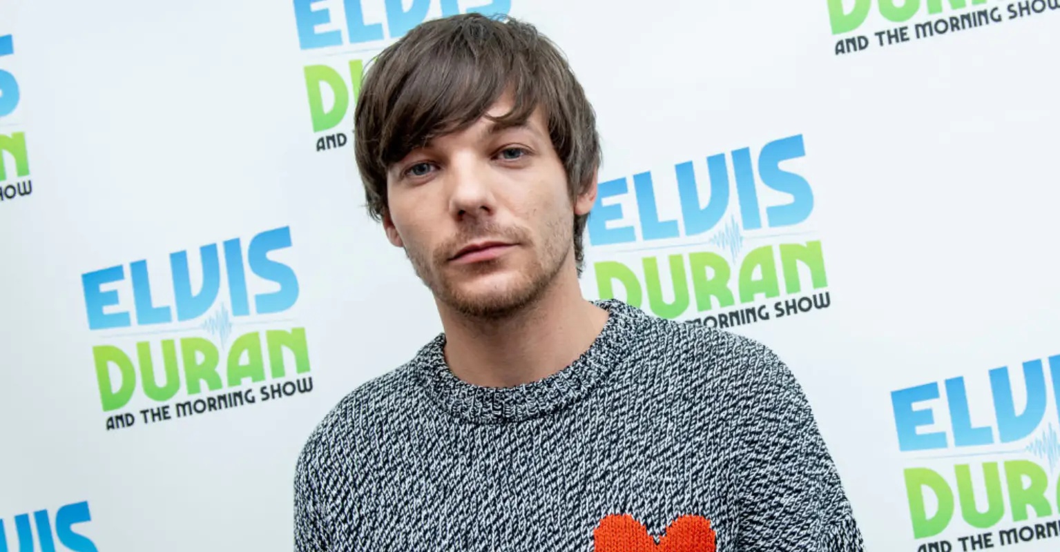 Louis Tomlinson addresses Harry Styles romance rumors