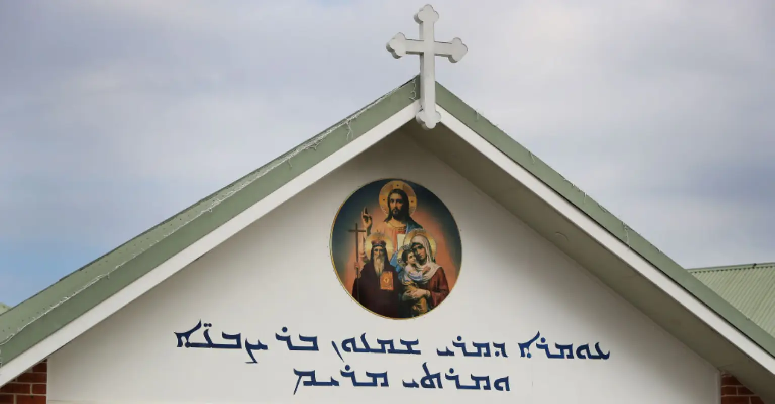 Bishop's incredible act moments after he is stabbed during Sydney church service