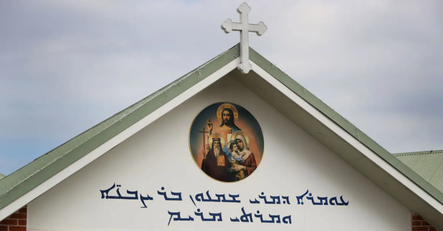 Bishop's incredible act moments after he is stabbed during Sydney church service