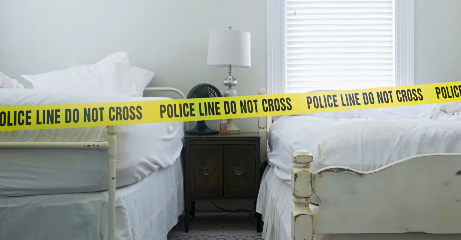 Man arrested after his mother is found 'fused' to maggot-infested bed