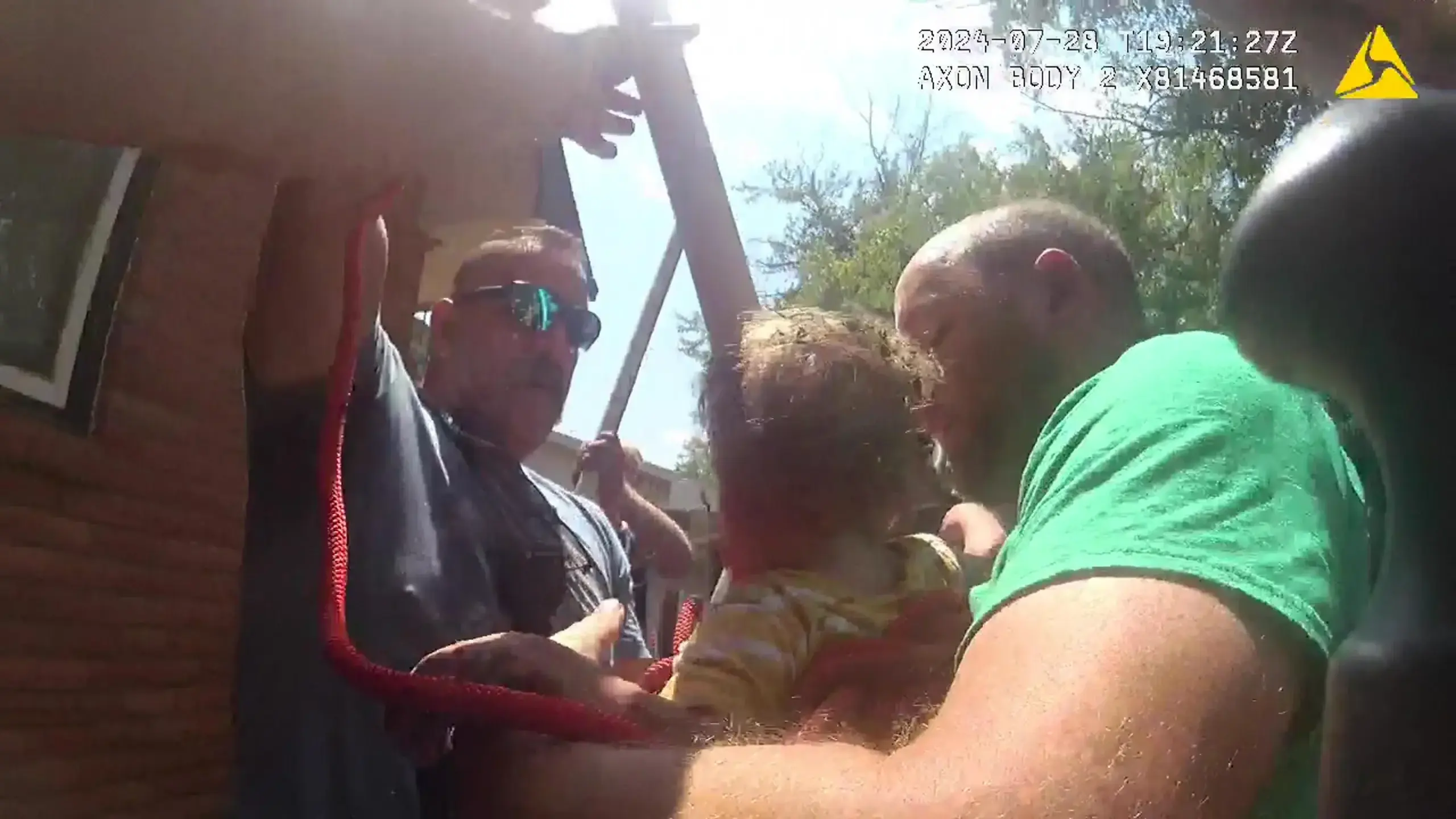 Body cam footage shows the moment the 14-month-old boy was rescued. Credit: Moundridge Police Department/Getty