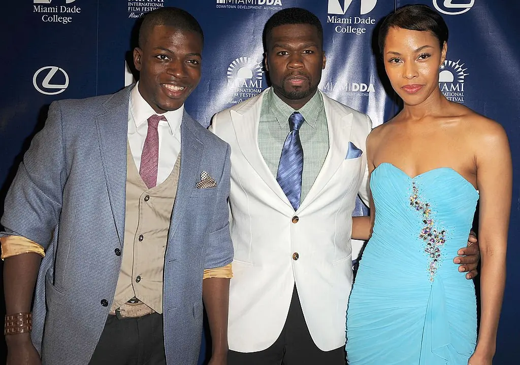 50 Cent with Cedric Sanders and Tracey Heggins at the World Premiere of Things Fall Apart at 2011 Miami International Film Festival. Credit: Gustavo Caballero / Getty