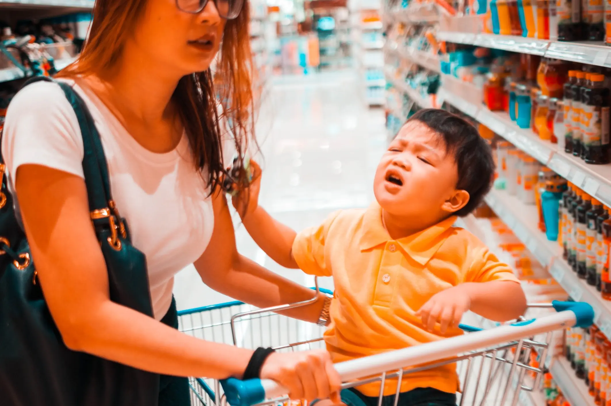 Many parents don't have the option to leave their kids at home, no matter how difficult they may make a shopping trip. Credit: Karl Tapales/Getty Images 