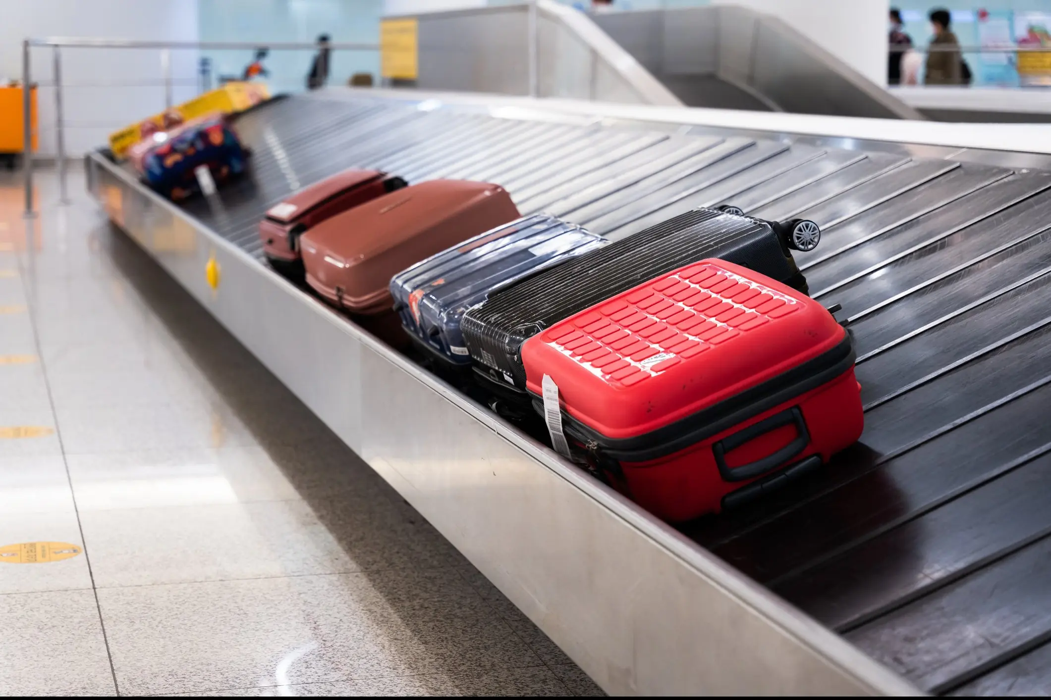 Your case goes through a lot between the time you hand it over at check-in and when you pick it up at your destination. Credit: Twenty47studio/Getty Images
