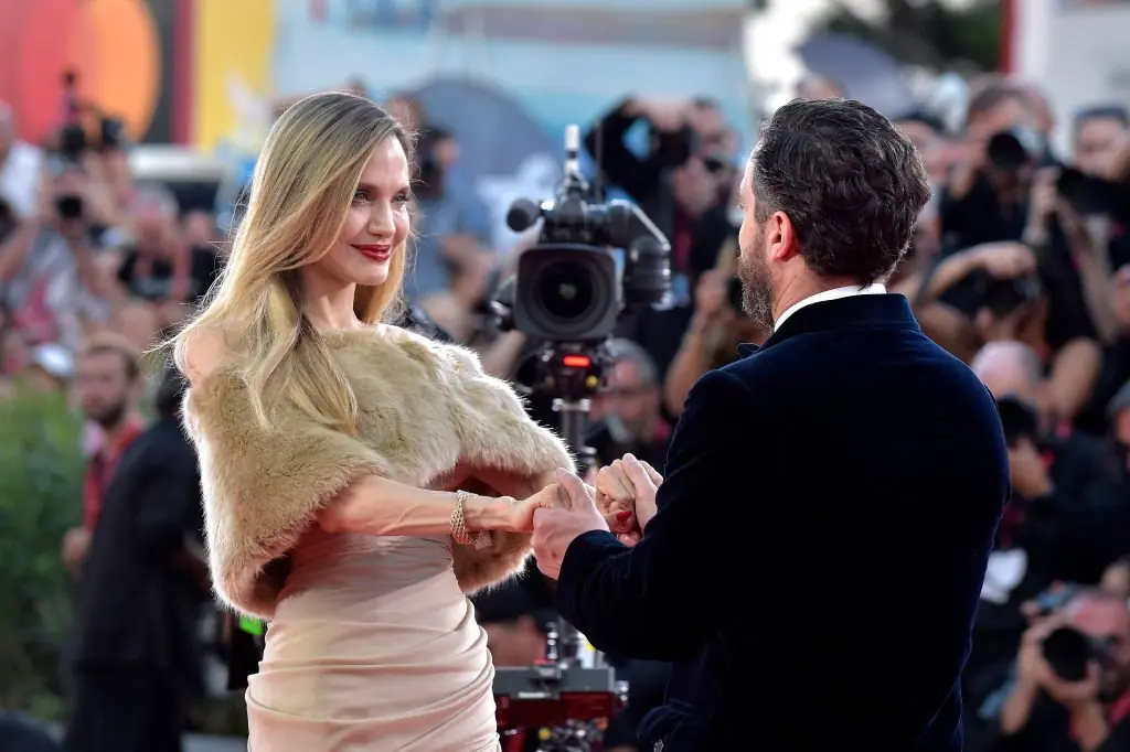 Angelina Jolie and Pablo Larrain pose for photos on the red carpet. Credit: Rocco Spaziani/Archivio Spaziani/Mondadori Portfolio/Getty