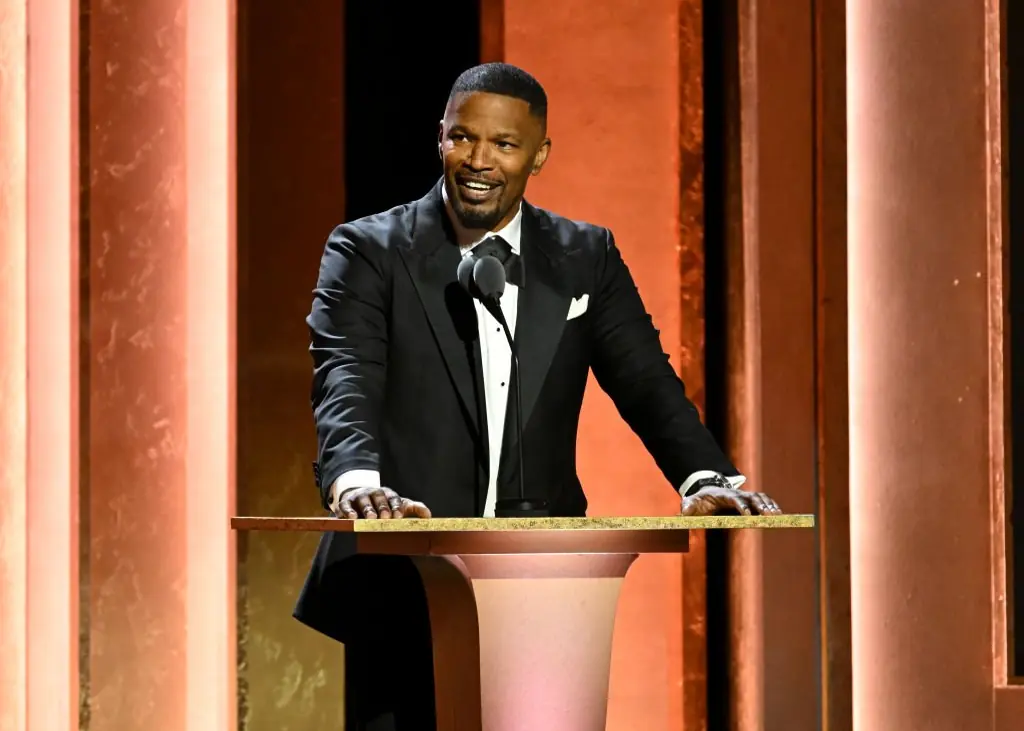 It's good to see Foxx back up and laughing. Credit: Gilbert Flores/Getty