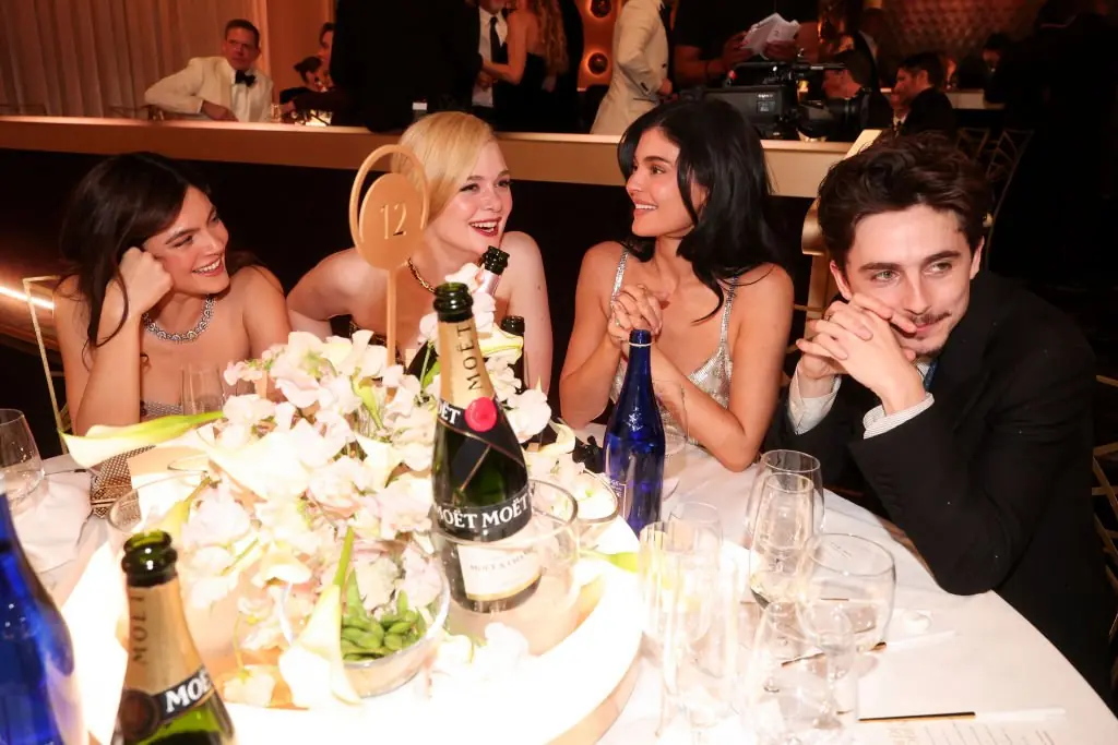 Kylie Jenner, and Timothée Chalamet were sat next to Monica Barbaro and Elle Fanning at the 82nd Annual Golden Globes. Credit:	Christopher Polk/GG2025 / Getty