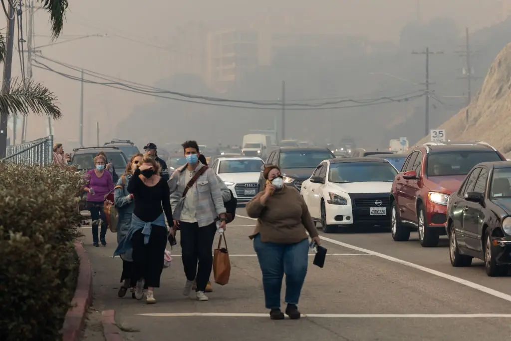 Residents seen evacuating the affected areas. Credit: VCG / Getty