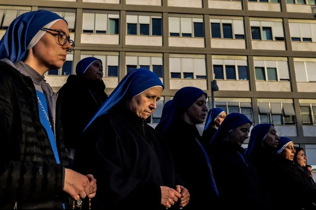 Nuns pray during a Rosary service in front of the Gemelli hospital. Credit: Alessandra Benedetti - Corbis/Corbis via Getty Images