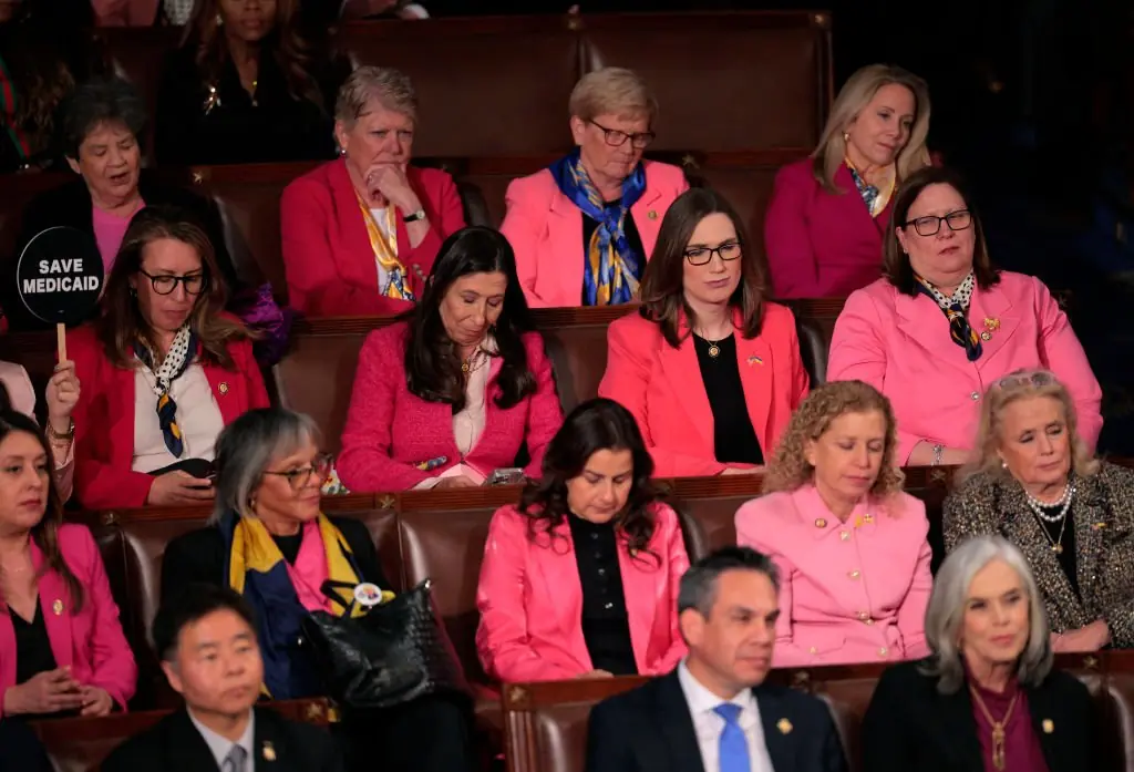 Democratic members of the House Women's Caucus wear pink as U.S. President Donald Trump addresses a joint session of Congress on March 4. Credit: Chip Somodevilla / Getty