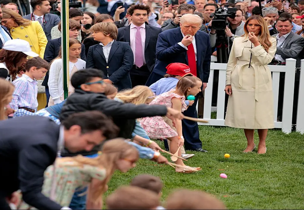 President Trump and First Lady Melania blow whistles to kick-off a race during the White House Easter Egg Roll. Credit: Chip Somodevilla/Getty Images