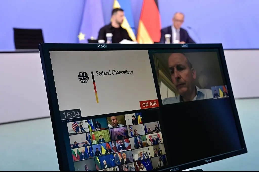 Zelensky and German Chancellor Friedrich Merz (back R) had a video conference with European leaders. Credit: Pool / Getty