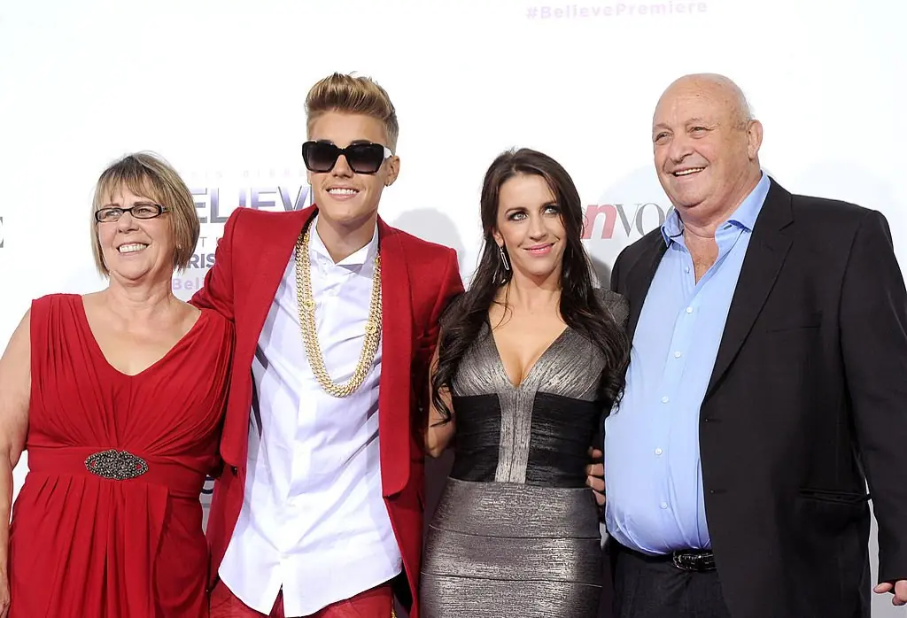Bieber with his grandma Diane, mom Pattie Mallette and grandpa Dale. Credit: Kevin Winter / Getty