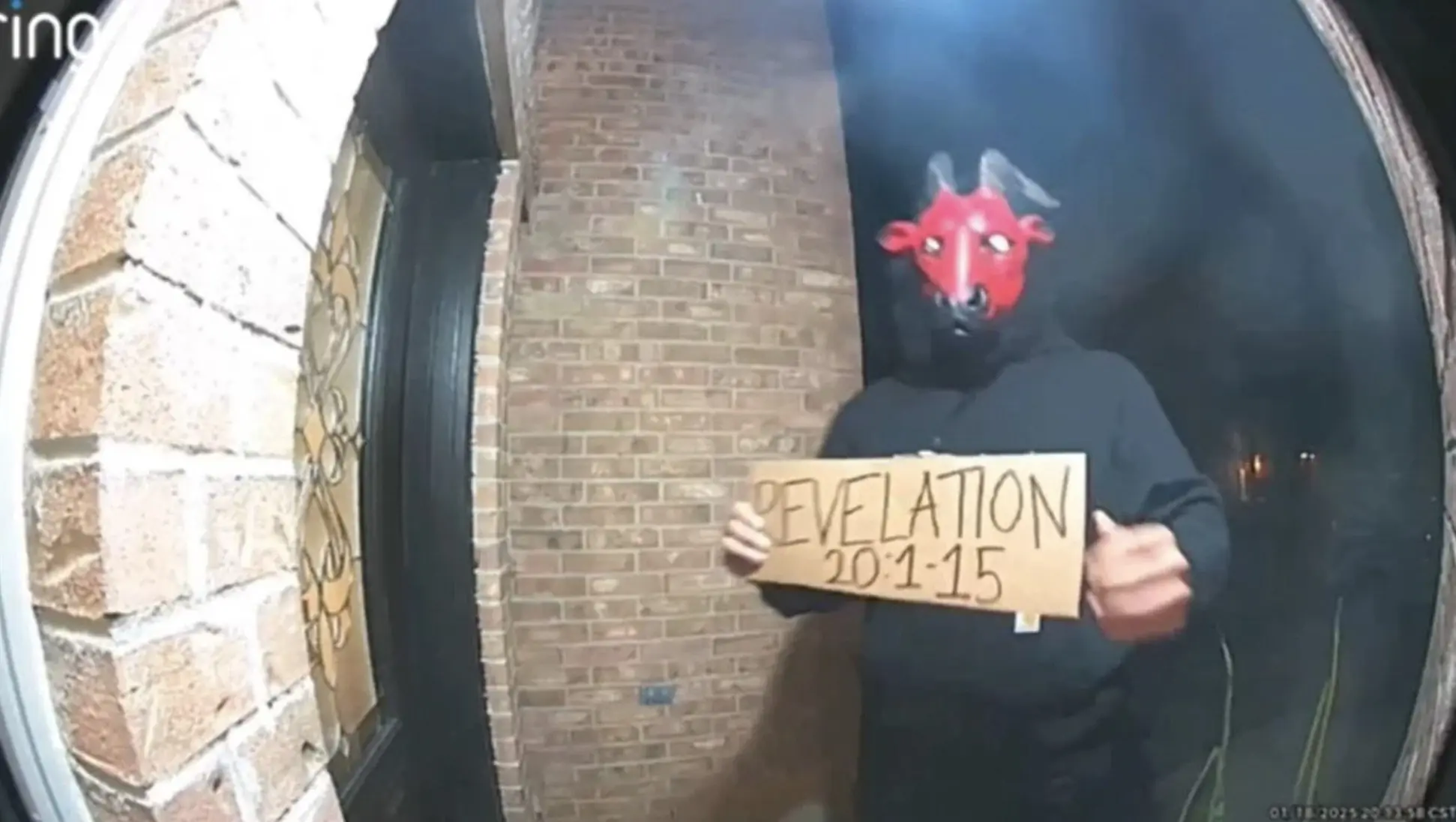 The creepy devil held up a sign with a bible verse. Credit: CBS Texas