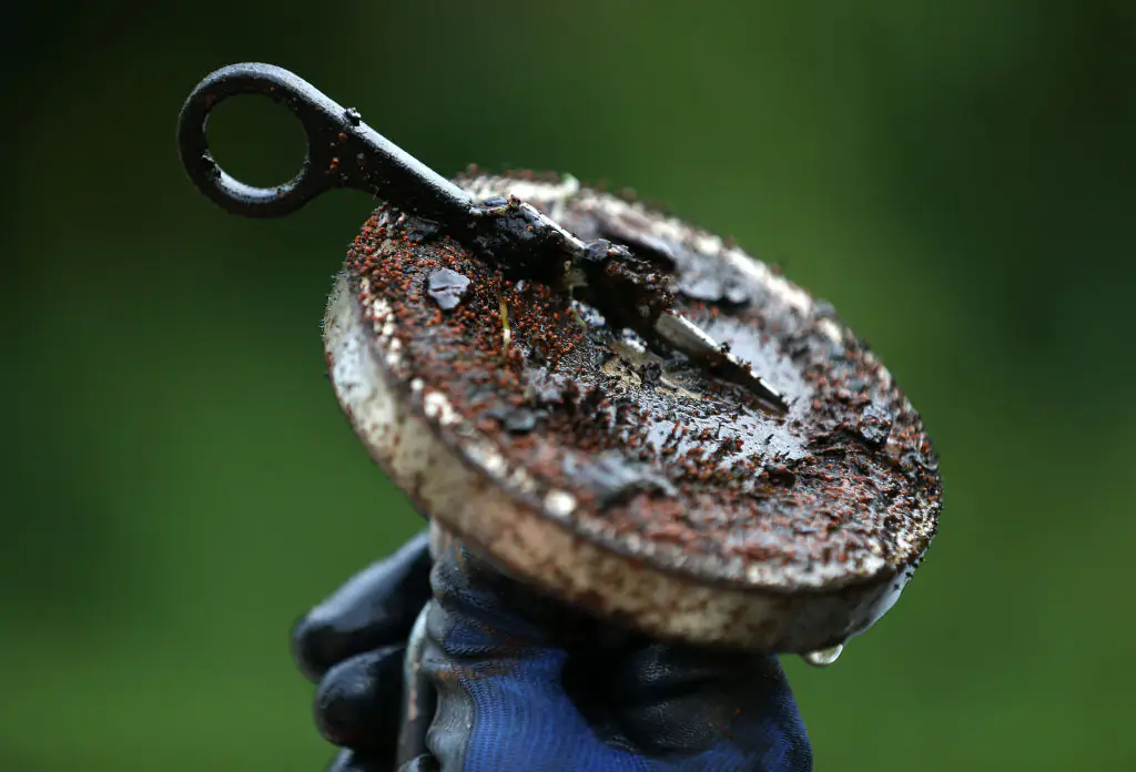Magnet Fishing involves using a strong magnet to find metal objects. Credit: David L. Ryan/The Boston Globe/Getty