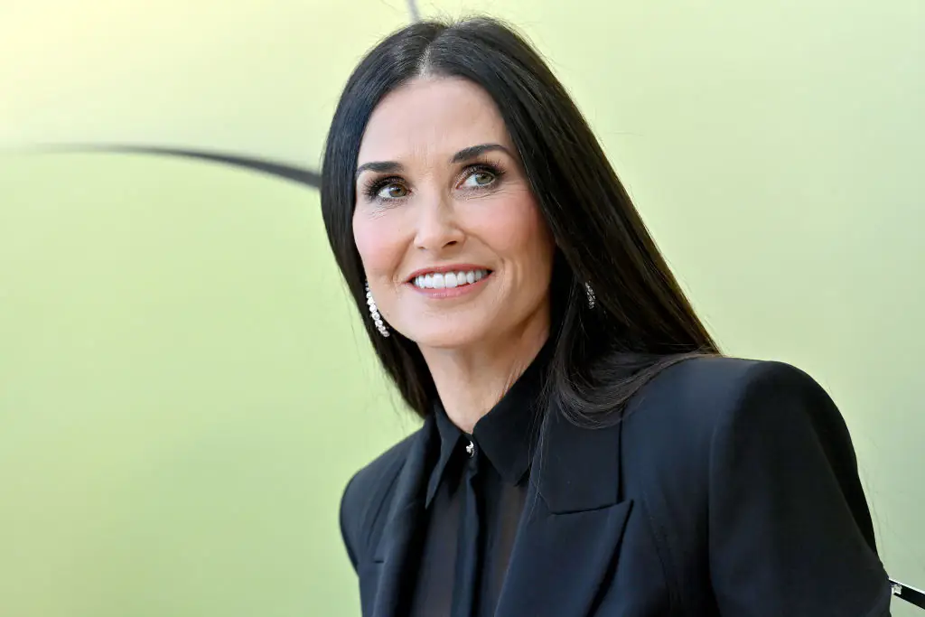 Demi Moore pauses speech to scold audience while introducing Cher at Cannes