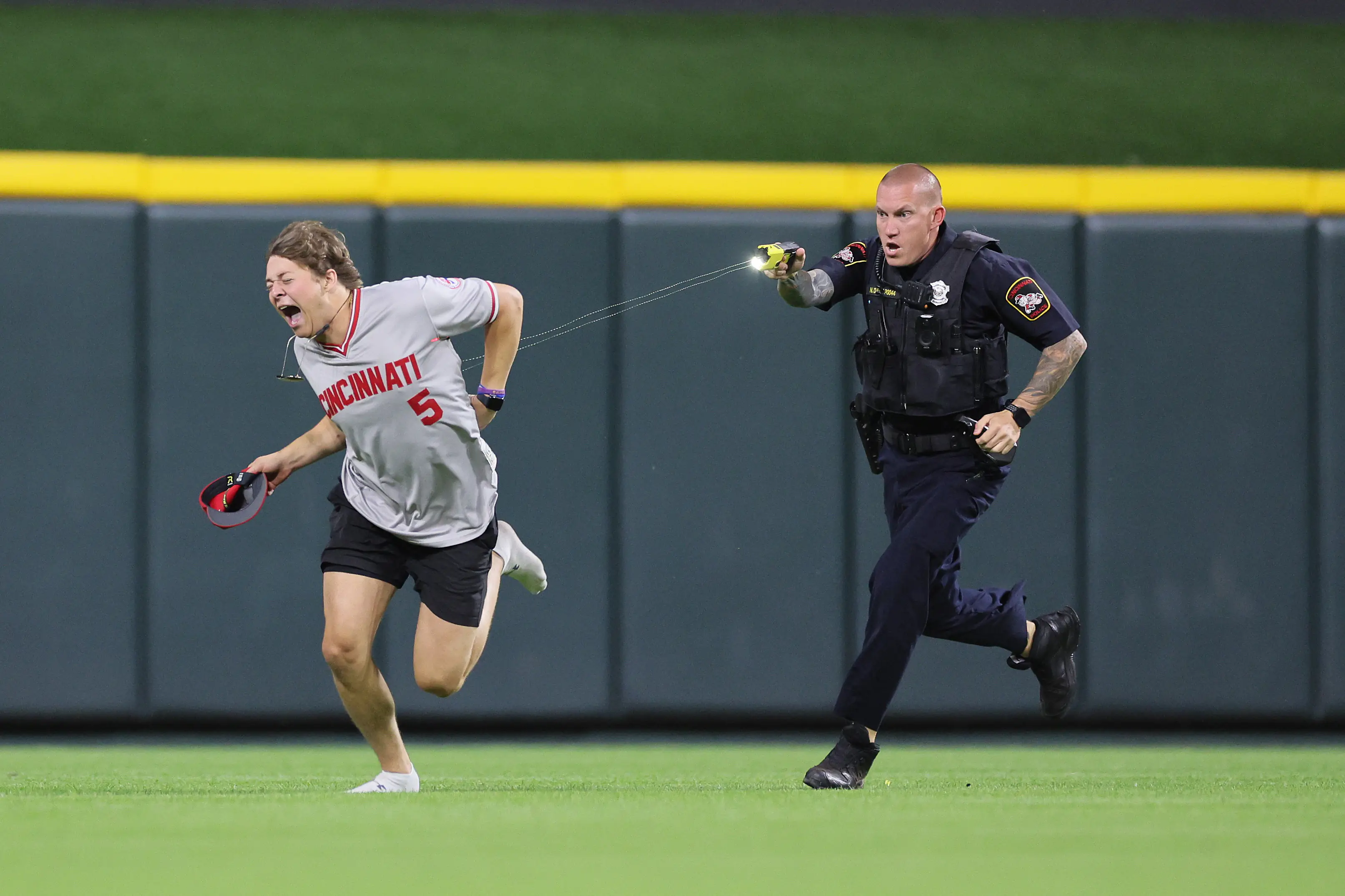 Fan invader tased as he runs onto baseball field