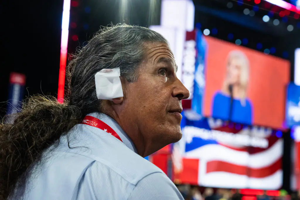 Arizona delegate Ray Michaels wears an ear bandage in solidarity with Donald Trump. Credit: Tom Williams/CQ-Roll Call, Inc/Getty