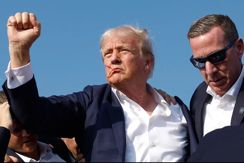 Trump raised a defiant fist before leaving the stage. Credit: Anna Moneymaker/Getty