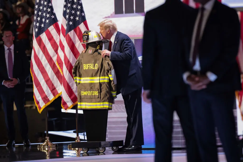 Trump kissed Comperatore's helmet. Credit: Scott Olson/Getty