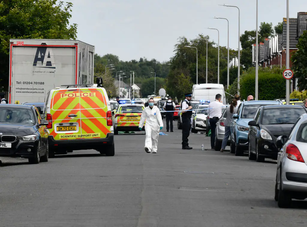 Officers and officials on the scene in Southport following the tragedy. Credit: Getty