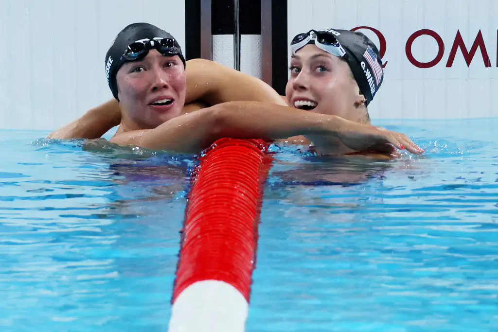 Team USA's Torri Huske and Gretchen Walsh after securing gold and silver. Credit: Clive Rose / Getty