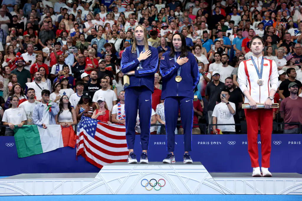 Some viewers found Huske's decision to invite Walsh onto her podium 