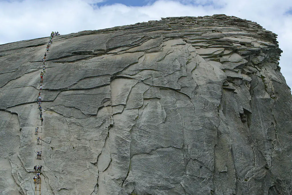 The trail to Half Dome in Yosemite National Park is one of the most famous in the park. Credit: Anacleto Rapping / Getty