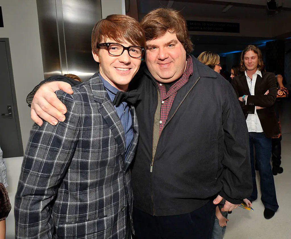 Bell (left, with Dan Schneider), who appeared in the doc, sued former Nickelodeon dialogue coach Brian Peck in 2004 for sexual abuse. Credit: Charley Gallay / Getty