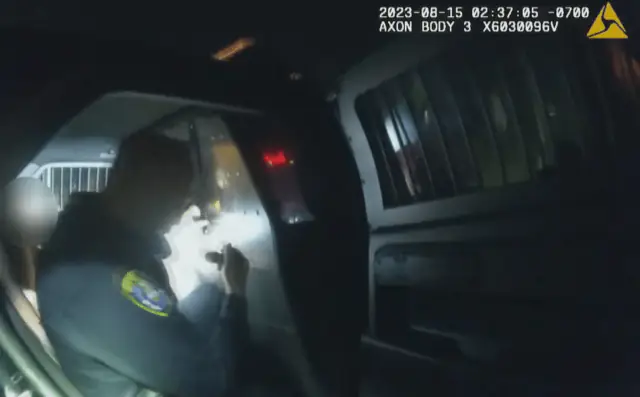 San Diego cop resigns after accidentally locking himself in the backseat with woman he'd just arrested