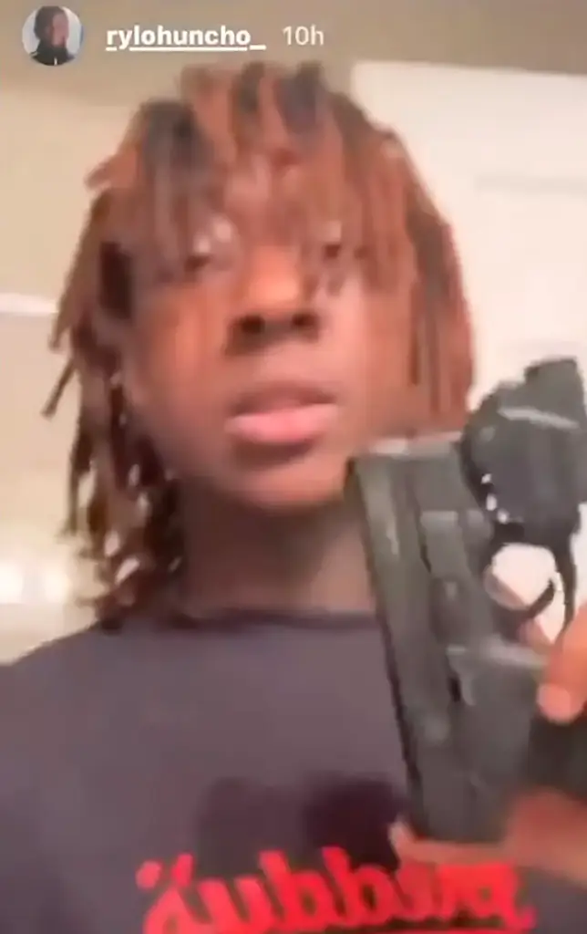 Rylo Huncho displaying the gun in his video. Credit: Instagram Story