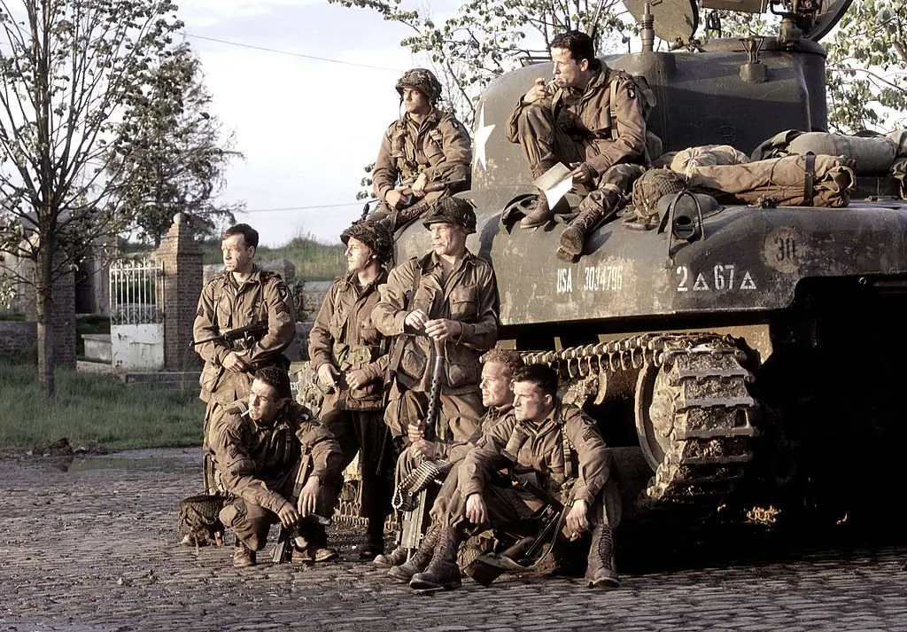 The Band of Brothers still shown to James McAvoy featured Phillip Barantini, Ross McCall, Scott Grimes, Donnie Wahlberg, Kirk Acevedo, Neal McDonough, Adam James, and Frank John Hughes. Credit: HBO via Getty Images