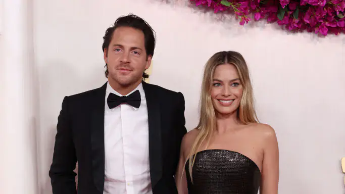 HOLLYWOOD, CALIFORNIA - MARCH 10: (L-R) Tom Ackerley and Margot Robbie attend the 96th Annual Academy Awards on March 10, 2024 in Hollywood, California. (Photo by Kevin Mazur/Getty Images)