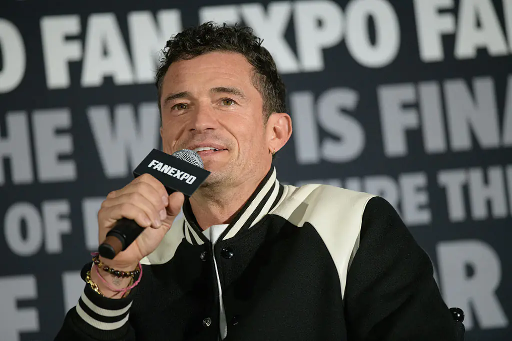 Orlando Bloom has been criticized online after opening up about the threesome scene. Credit: Thomas Cooper / Getty